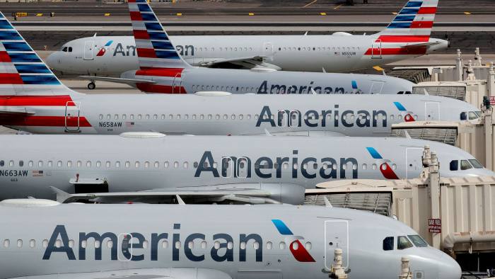 American airlines to cut more management jobs reduce july schedule
